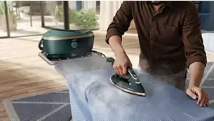 vrs_a06c4bcc102a4abc0297af67b4541871323691ad_1765121481663 PHILIPS parna stanica PSG8300/80 sa PHILIPS Daskom za peglanje GC221/98